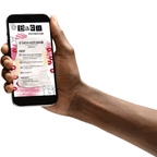 Hand holding a smartphone displaying a website on a white background